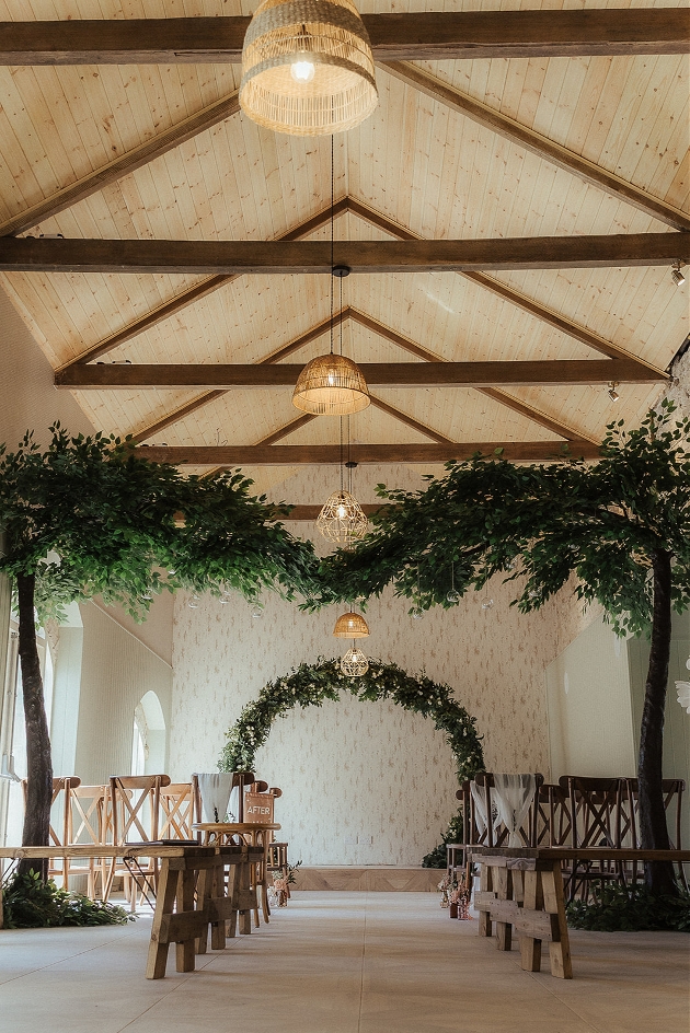 barn venue with large foliage trees